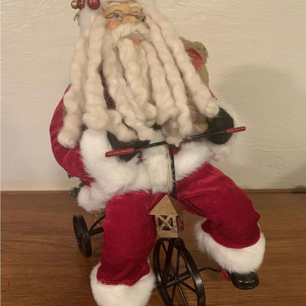 Santa Claus on tricycle Christmas decoration